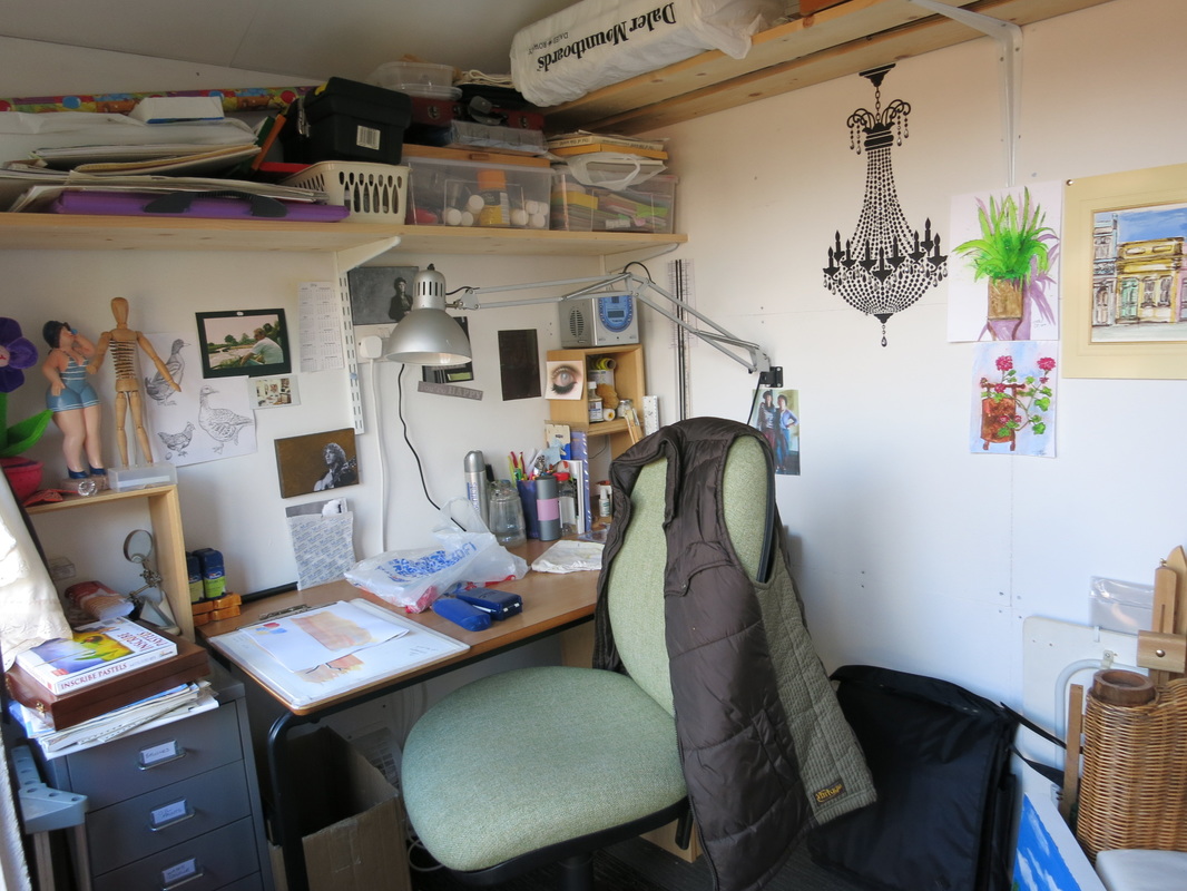 An art studio in a garden shed! Great craft room idea with photos showing how perfect it is.