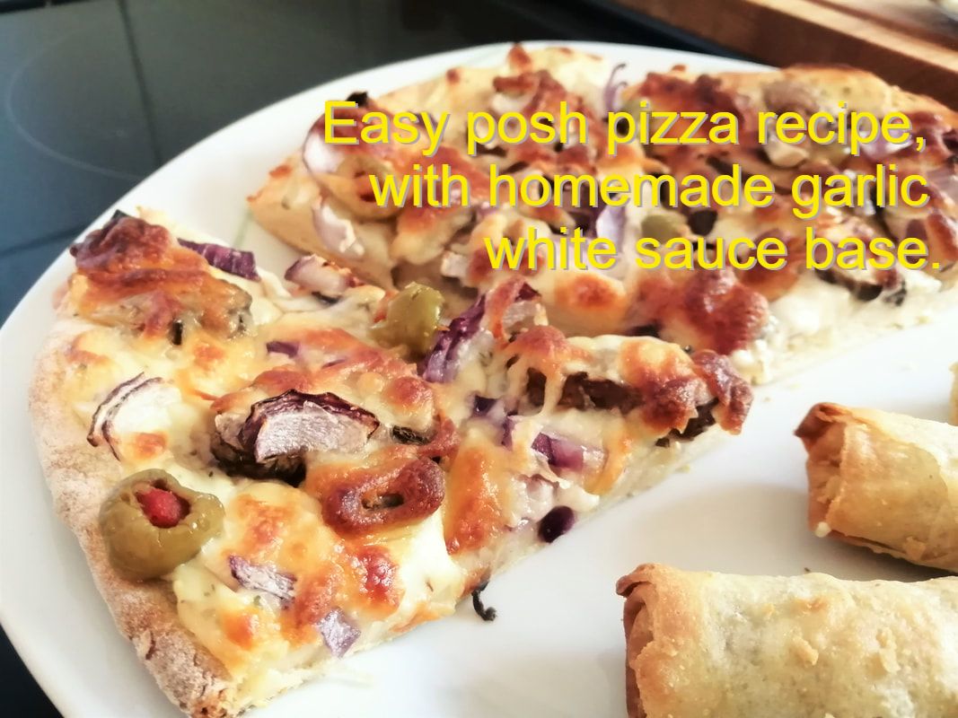Easy posh pizza recipe, with homemade garlic white sauce base.
